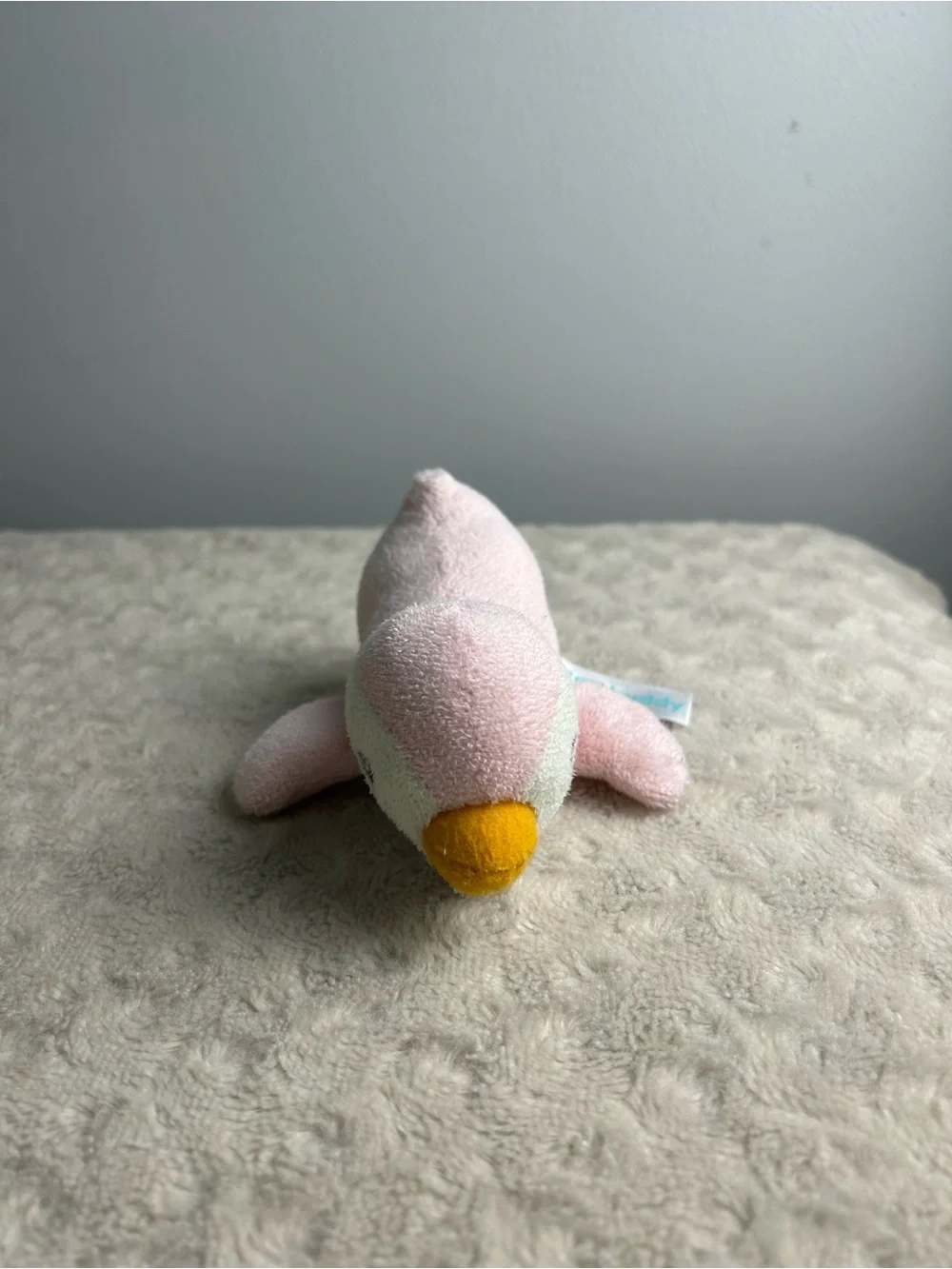 RaZbuddy Pink Penguin Plush Pacifier Holder White Orange RaZbaby Lovey